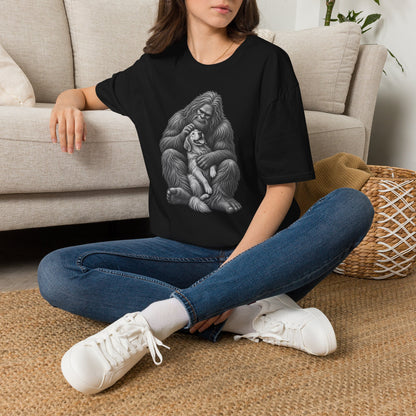 Bigfoot & Puppy Tee — Gentle Sasquatch Holding Dog Graphic T-Shirt