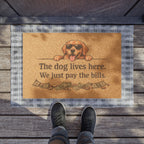 Doormat — “The Dog Lives Here, We Just Pay the Bills” Funny Welcome Mat (Dog Lover Gift)