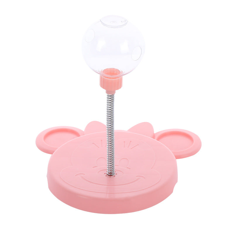 Throwing the cat a ball to distract it while avoiding feeding it